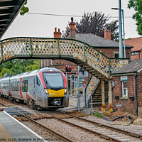 Buy canvas prints of Commuter train in Brundall Gardens station by Chris Yaxley