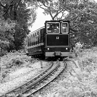 Buy canvas prints of Mount Snowdon Railway, Llanberis, North Wales. A diesel train ca by Chris Yaxley