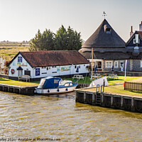 Buy canvas prints of Acle Bridge pub on the Norfolk Broads by Chris Yaxley