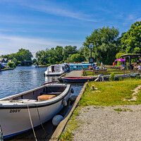 Buy canvas prints of A view down the River Bure, Wroxham, Norfolk by Chris Yaxley