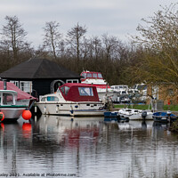 Buy canvas prints of Norfolk Broads Boat Yard by Chris Yaxley