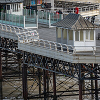 Buy canvas prints of Public beach hut on Crmer pier by Chris Yaxley