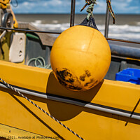 Buy canvas prints of Buoy on boat, Cromer beach by Chris Yaxley