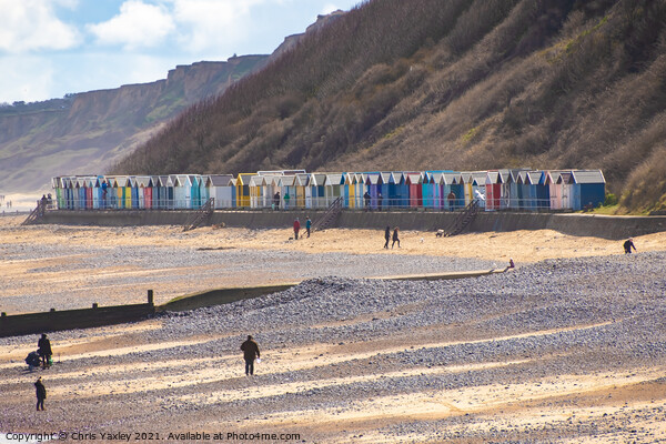 Colorful beach huts on the promenade, North Norfolk coast Picture Board by Chris Yaxley