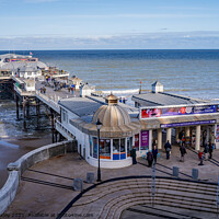 Buy canvas prints of A view over Cromer pier and promenade by Chris Yaxley