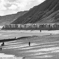 Buy canvas prints of Cromer beach and beach huts on the North Norfolk coast by Chris Yaxley