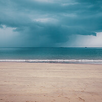 Buy canvas prints of Unsettled dark sky over the beach in Brittany by Laurent Renault