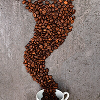 Buy canvas prints of Spilled cup of coffee with beans as smoke shape by Laurent Renault