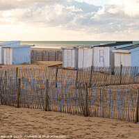 Buy canvas prints of Beach and cabins in Calais harbor in France by Laurent Renault