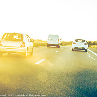 Buy canvas prints of On blur traffic road with colorful bokeh light abstract. Real tr by Laurent Renault