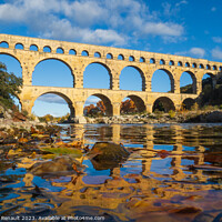 Buy canvas prints of The Pont du Gard viewed from the river. Ancient Roman aqueduct b by Laurent Renault