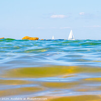 Buy canvas prints of Sailing boats and waves seen by a swimmer at sea level, photogra by Laurent Renault