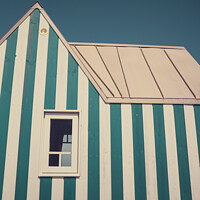 Buy canvas prints of Little blue and white striped tiny house. Photography taken in F by Laurent Renault