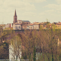 Buy canvas prints of Lot river with old bridge and town, Montauban, Lot, Occitanie, F by Laurent Renault
