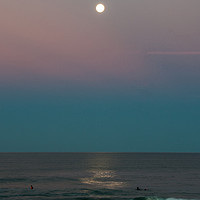 Buy canvas prints of Surfing By Moonlight by Shaun Carling