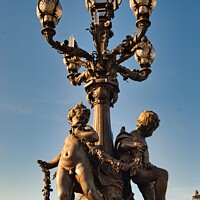 Buy canvas prints of Ornate Lights on the Pont Alexandre III  by Navin Mistry