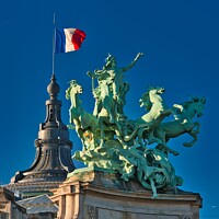 Buy canvas prints of The French Flag and statue on the Pont Alexandre III by Navin Mistry