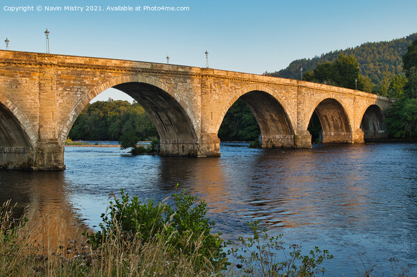 Dunkeld Bridge illuminated by the sunset Picture Board by Navin Mistry