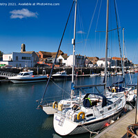 Buy canvas prints of Sailing Boats in Eyemouth Harbour by Navin Mistry