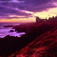 Buy canvas prints of Slains Castle seen at sunset with a stormy sky  by Navin Mistry
