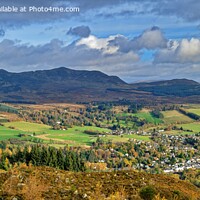 Buy canvas prints of A view of Pitlochry and Ben Vrackie in Autumn by Navin Mistry