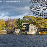 Buy canvas prints of A view of Pitlochry Dam in Autumn by Navin Mistry