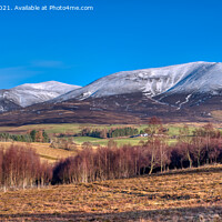 Buy canvas prints of A view of snow covered Beinn a' Ghlò by Navin Mistry