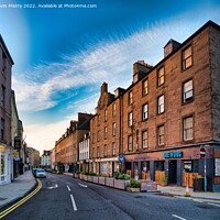 Buy canvas prints of A view of historic George Street, Perth, Scotland by Navin Mistry