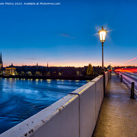 Buy canvas prints of A view of Perth Bridge and the River Tay at night by Navin Mistry