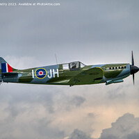 Buy canvas prints of A replica Spitfire flown at Perth Airport Open Day by Navin Mistry