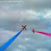 Buy canvas prints of Red Arrows Crossing  Manoeuvre RAF Leuchars 2011 by Navin Mistry