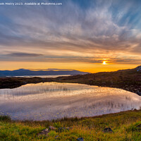 Buy canvas prints of Sunrise over a Lochan Isle of Harris. by Navin Mistry
