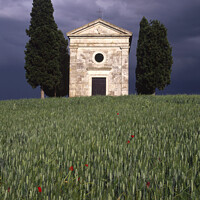 Buy canvas prints of Capella di Vitaleta Tuscan chapel Val D Orcia in a summer thunder storm by Navin Mistry