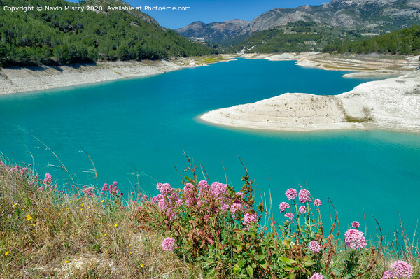 Guadalest Reservoir, below the village of Guadalest, Spain. Picture Board by Navin Mistry