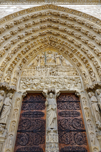 The ornate doorway of Notre Dame Cathedral, Paris, France Picture Board by Navin Mistry
