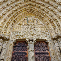 Buy canvas prints of The ornate doorway of Notre Dame Cathedral, Paris, France by Navin Mistry