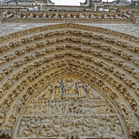 Buy canvas prints of The Ornate carved door way of Notre Dame Cathedral, Paris,  by Navin Mistry