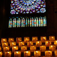 Buy canvas prints of Candles inside Notre Dame Cathedral Paris by Navin Mistry