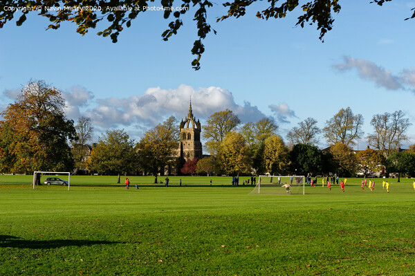 A football match takes place on the South Inch, Perth, Scotland Picture Board by Navin Mistry