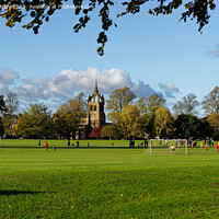 Buy canvas prints of A football match takes place on the South Inch, Perth, Scotland by Navin Mistry