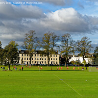 Buy canvas prints of A football match on the North Inch, Perth, Scotland by Navin Mistry