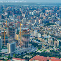 Buy canvas prints of Baku Skyline with the Flame Towers under construction by Navin Mistry