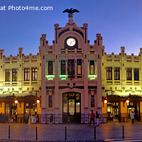 Buy canvas prints of Estació del Nord, Valencia. The main railway station of Valencia seen at dusk. by Navin Mistry
