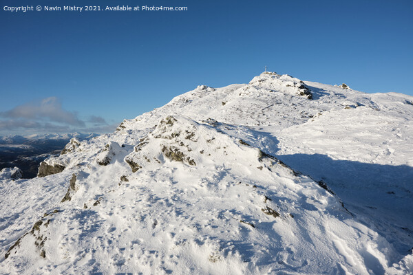 Summit of Ben Ledi, near Callander, Scotland, seen with winter snow Picture Board by Navin Mistry