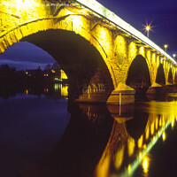 Buy canvas prints of Perth Bridge (or Smeaton's Bridge) lit up at night by Navin Mistry