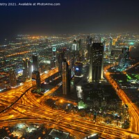 Buy canvas prints of A night time view over Dubai, UAE, seen from the Burj Khalifa by Navin Mistry