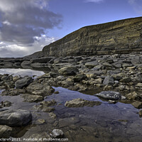 Buy canvas prints of Rocky pools on the beach at Monknash by Gordon Maclaren