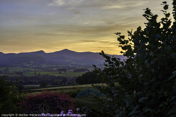 Sunset over Pen y Fan and Corn Du in the Brecon Be Picture Board by Gordon Maclaren