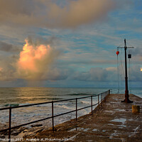 Buy canvas prints of Sunrise over Porthleven Harbour, photographed from the jetty by Gordon Maclaren