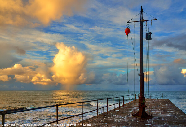Sunrise over the Cornish Sea, photographed from Porthleven jetty Picture Board by Gordon Maclaren